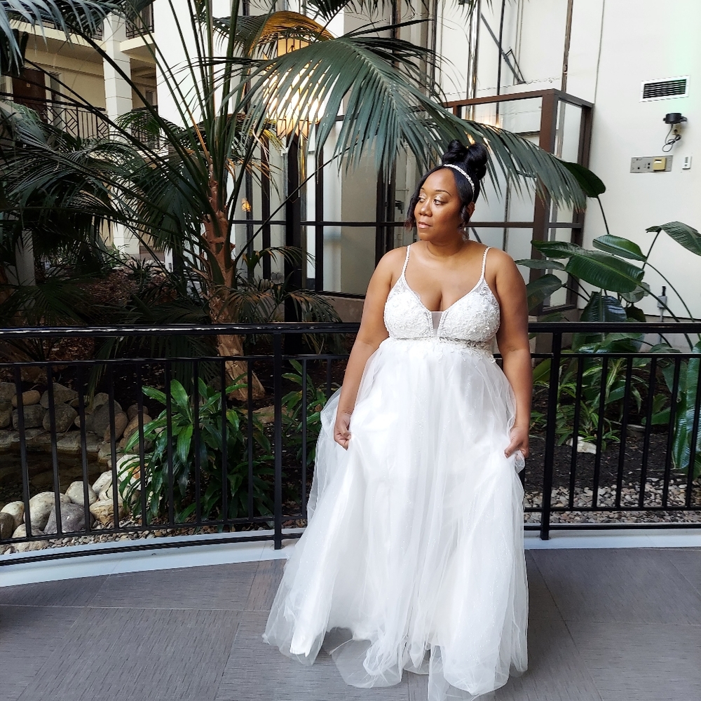 Plus size wedding gown. Worn once for a photoshoot.